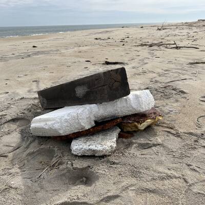 Assortment of trash littering Cape Hatteras National Seashore