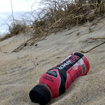 plastic bottle left on beach
